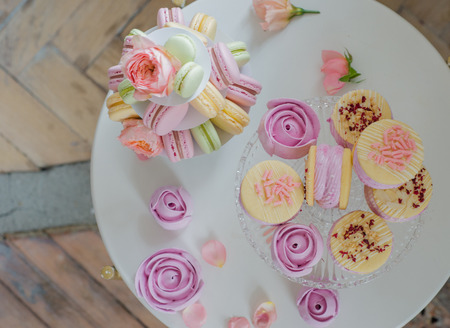 macaroon, Variety desserts of light colors on white tableの写真素材
