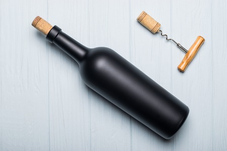 Wine bottle on background. Mock-up. White tableの写真素材