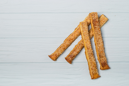 salted crispy cookies with sesame seeds on white backgroundの写真素材