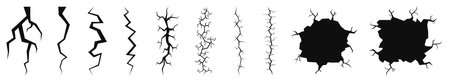 Set of cracks and holes. Split and damage. Vectorのイラスト素材