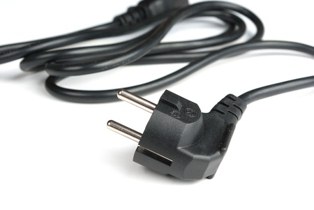 Black electric cable isolated on white backgroundの写真素材