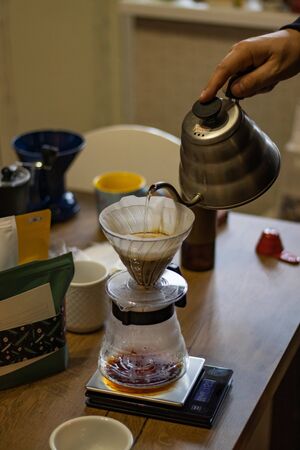 Devices for Alternative coffee brewing. Transparent glass pour over dripper with paper filterの写真素材