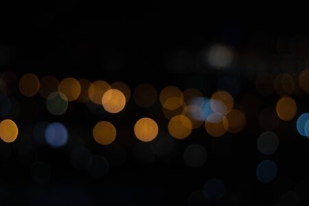 Blue and Orange Night City Lights. Bokeh at night backgroundの写真素材