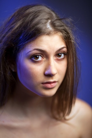A portrait of nice young woman in studioの写真素材