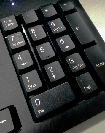Detail numeric keypad on the black computer keyboard