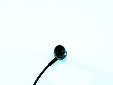 Black headphones isolated on a white backgroundの写真素材