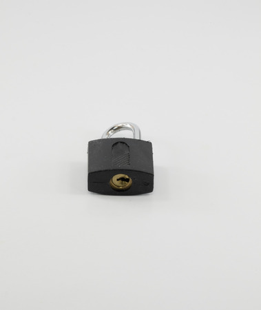 Padlock with keys on white backgroundの写真素材