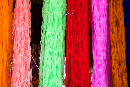 many sewing thread and weaving in the tailor'sの写真素材