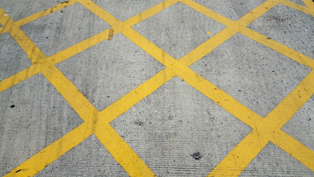 Grungy yellow road paint patternの写真素材