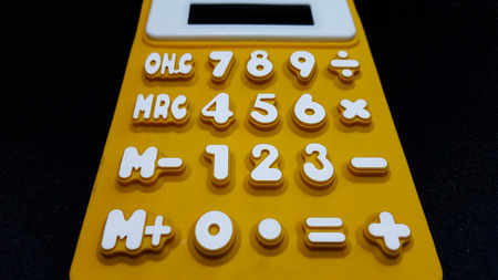 Calculator on a back Background