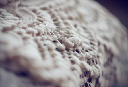 On the background of hanging delicate lace fabric white in which you can go to the celebrationの写真素材