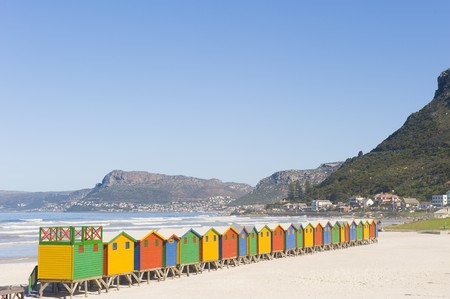 Brightly colored dressing huts on Muizenberg beach near Cape Town.の写真素材