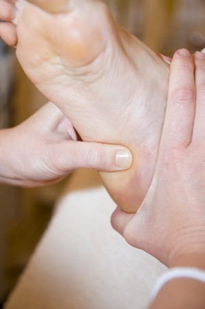An attractive mature lady undergoing aromatherapy and massaging.の写真素材