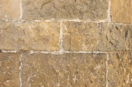 Old but well maintained brickwork on a wall in Barcelona.