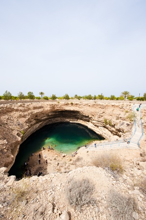 Sinkhole on the coast of Omanの写真素材