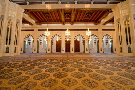 Lavish and beautifully designed inside of the Sultan Qaboos Grand Mosque in Muscat, Oman, also showing the crystal chandeliers のeditorial素材