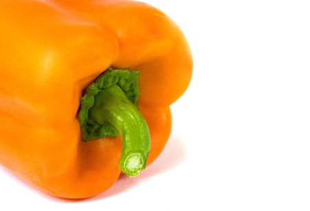 Orange pepper on a white backgroundの写真素材