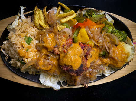 vegetarian sizzler served on a hot plateの写真素材