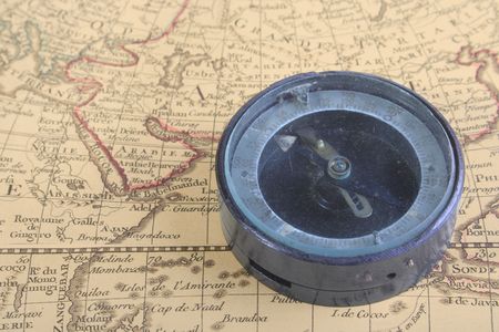 Ancient compass on ancient and very old map. Compass is over India ocean.の写真素材