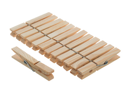 Wooden clothespins isolated on white backgroundの写真素材