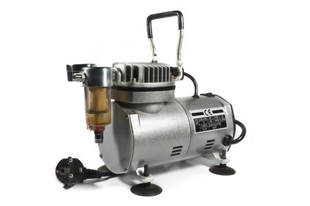 Metal shiny air compressor isolated on white background.の写真素材