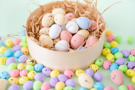 Multicolored eggs and nest on Easter Day