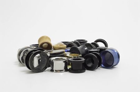 Ear stretchers: plugs and ear tunnels. Varied types, colors and sizes