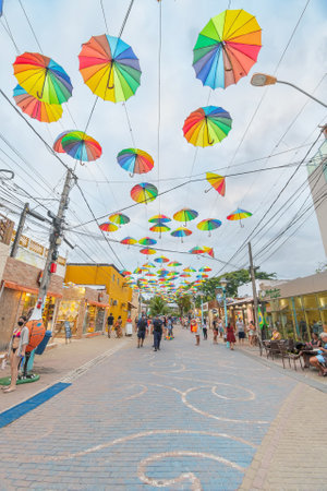 Ipojuca, PE, Brazil - October 14, 2021: street decorated with colored frevo umbrellas in Porto de...