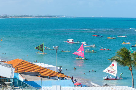 Ipojuca, PE, Brazil - October 15, 2021: tourist rafts of Porto de Galinhas beach.のeditorial素材