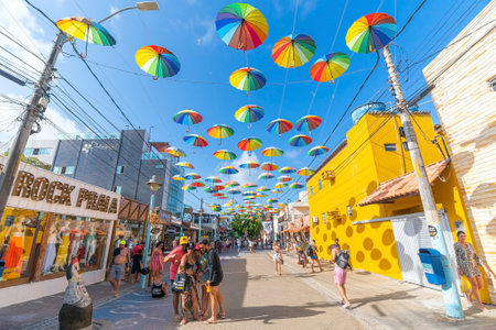 Ipojuca, PE, Brazil - October 15, 2021: street decorated with colored frevo umbrellas in Porto de...