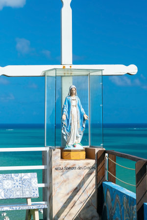 Maragogi, AL, Brazil - October 17, 2021: image of Our Lady of Graces and a white cross at Alto do Cruzeiro belvedere.のeditorial素材