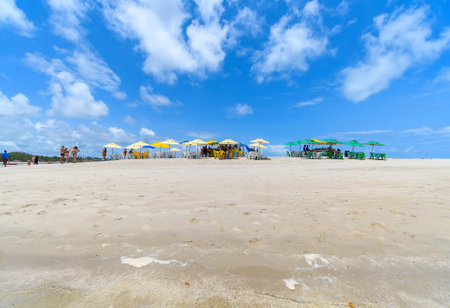 Sirinhaem, PE, Brazil - October 18, 2021: people on the sand banks of Guadeloupe beach, one of the tourist destinations for people visiting Porto de Galinhas.のeditorial素材