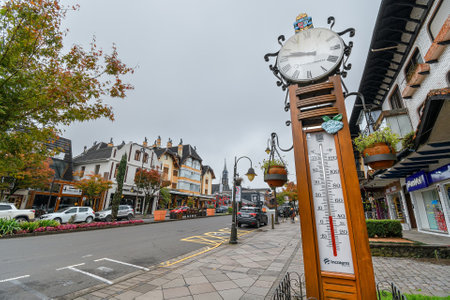 Gramado, RS, Brazil - May 19, 2022: thermometer marking a temperature of about 6 degrees in downtown of Gramado on Borges de Medeiros avenue.のeditorial素材
