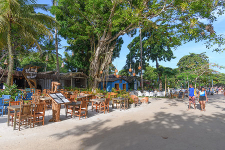 Trancoso, district of Porto Seguro, BA, Brazil - January 06, 2023: the Quadrado of Trancoso, a tourist place with restaurants and bars.のeditorial素材
