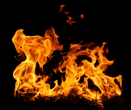 Fire flames isolated on a black backgroundの写真素材