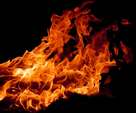 Fire flames isolated on a black backgroundの写真素材