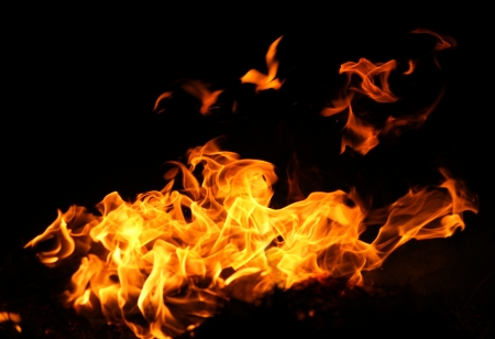 Fire flames isolated on a black backgroundの写真素材
