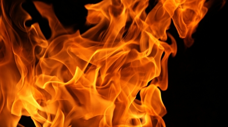 Fire flames isolated on a black backgroundの写真素材