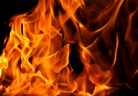 Fire flames isolated on a black backgroundの写真素材