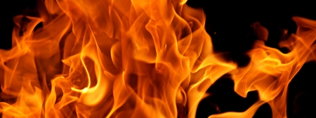 Fire flames isolated on a black backgroundの写真素材