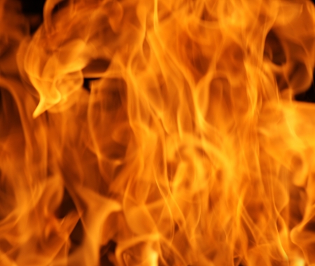 Fire flames isolated on a black backgroundの写真素材