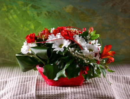 Beautiful bouquet of bright flowers in basket の写真素材