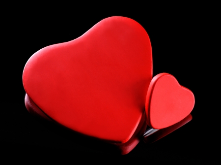 Two hearts on a dark backgourndの写真素材