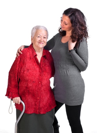 Happy grandmother with granddaughter on a white background の写真素材