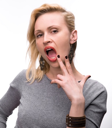 Portrait of emotional blond woman on a white background