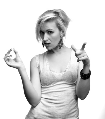Emotional sexy woman posing with cigarette on a white backgroundの写真素材
