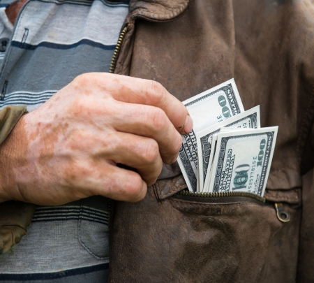 The farmer with earned money in his pocket