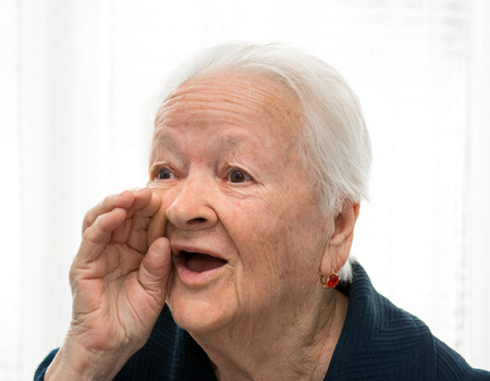 Portrait of shouting old woman の写真素材