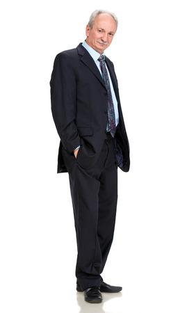 Senior full length businessman posing  on a whiteの写真素材