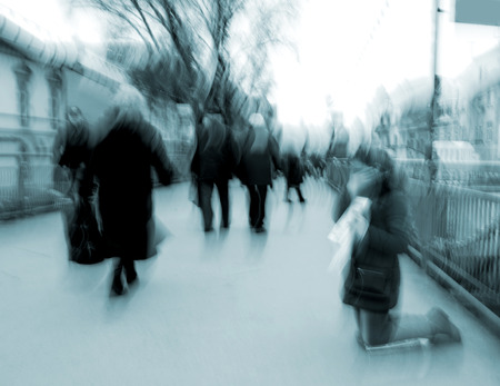 People in the streets of the city in motion blurの写真素材
